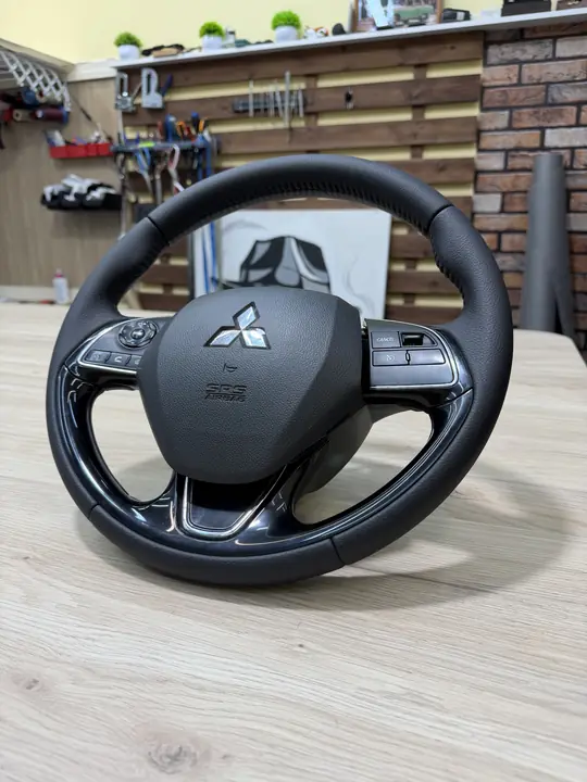 Перетяжка руля Mitsubishi — после