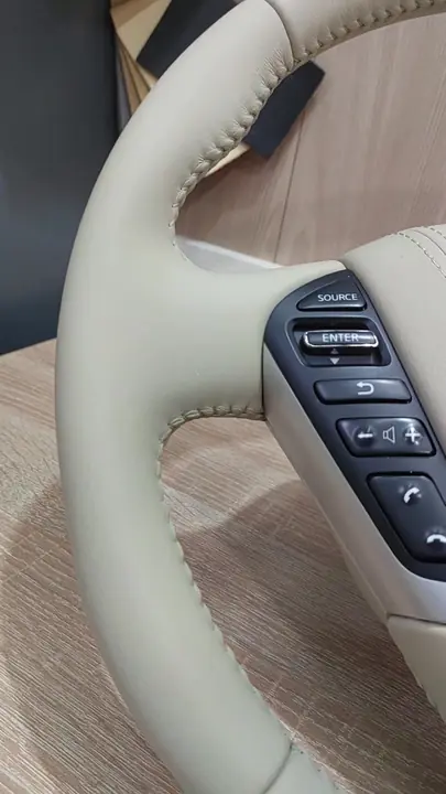 Перетяжка руля и ручки АКПП Nissan в бежевую кожу — фото 2