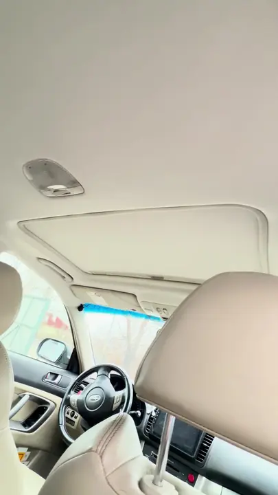 Перетяжка потолка Subaru после протечки люка — после
